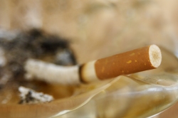 Cigarette stubbed out in ashtray